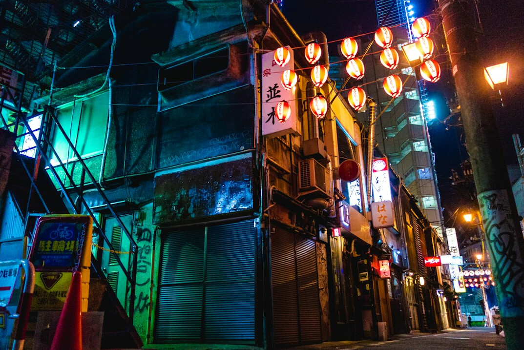 Colorful neon-lit street in Shinjuku Tokyo at night