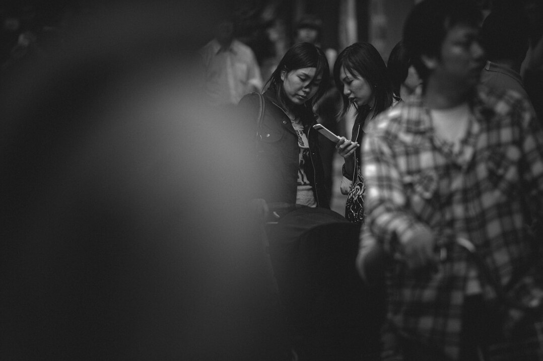 Portrait of a Japanese female musician holding a microphone