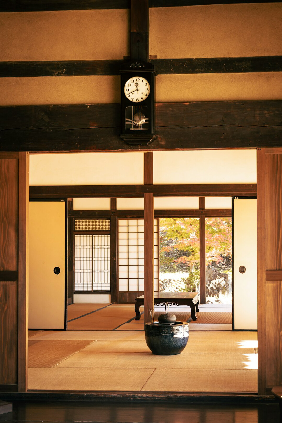 Interior of a traditional Japanese ryokan tatami room with tea set